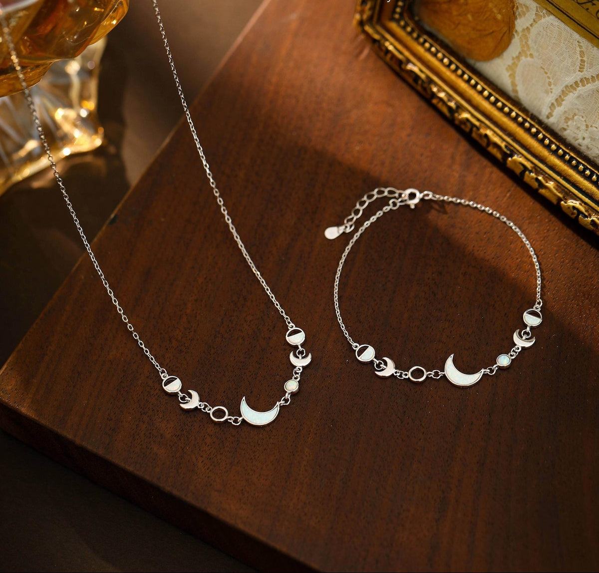 White opal moon phases sterling silver bracelet with fire opal crescent moon charm