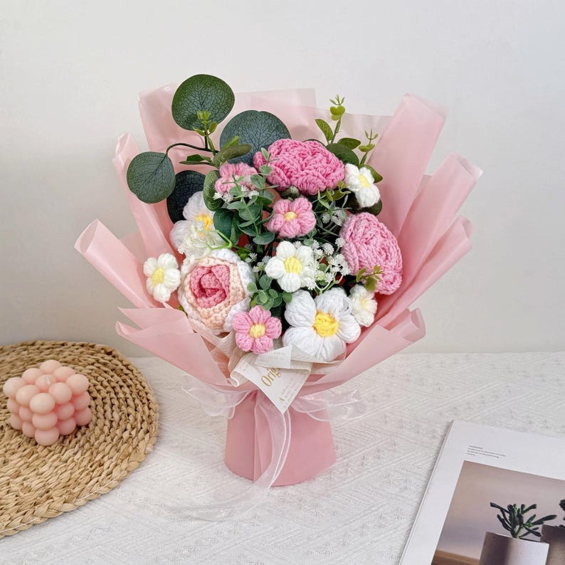 handmade crochet rose bouquet with pink yarn flowers and green stems