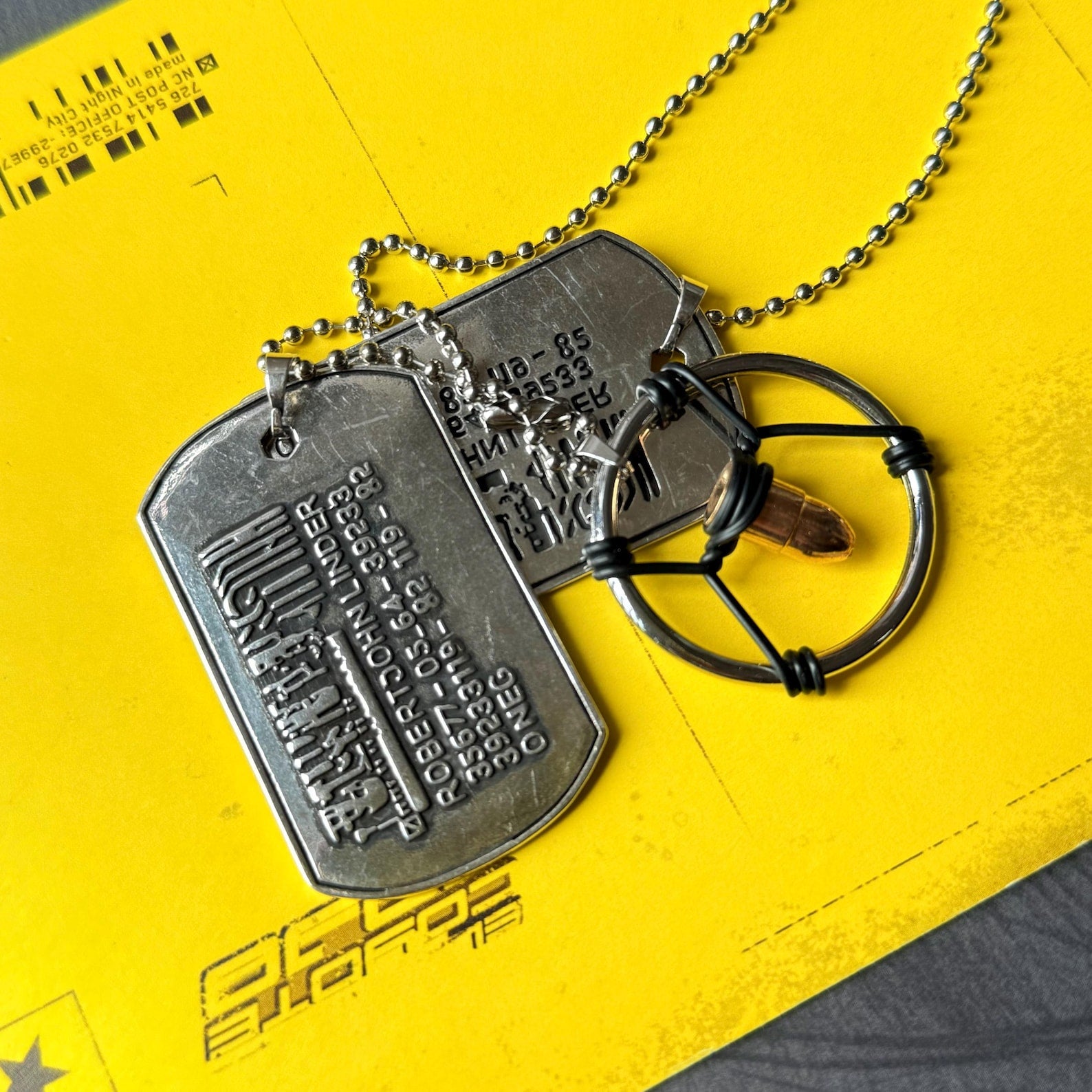 Cyberpunk Silverhand bullet necklace for gamers with metallic pendant