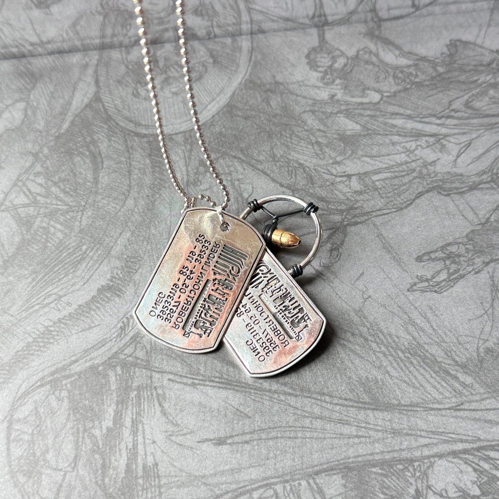 Cyberpunk Silverhand bullet necklace for gamers with metallic pendant