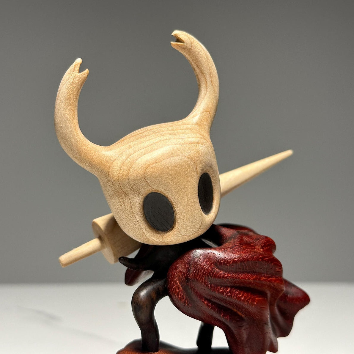 Hollow Knight inspired walnut wood sculpture with magnetic detachable figurine