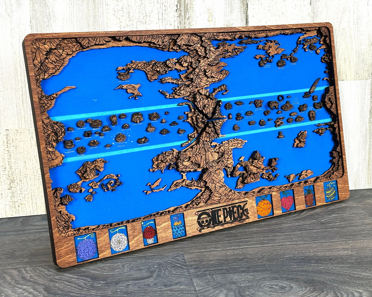 Mahogany stained layered One Piece world map with blue sea and eight fruit panels leaning on a whitewashed wood wall.
