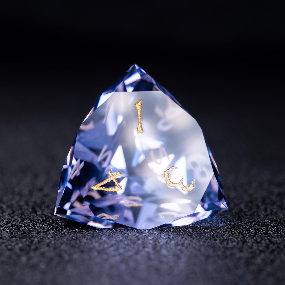 Faceted blue-violet clear d4 die with gold numbers 1, 4 and 3 on a dark sparkly surface