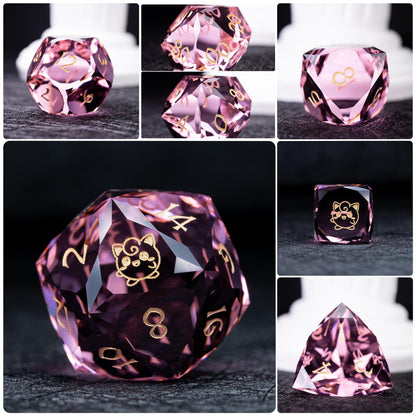Collage of seven pink clear dice with gold numbers; d20 and d6 show a gold round curly-haired creature, dark backdrop