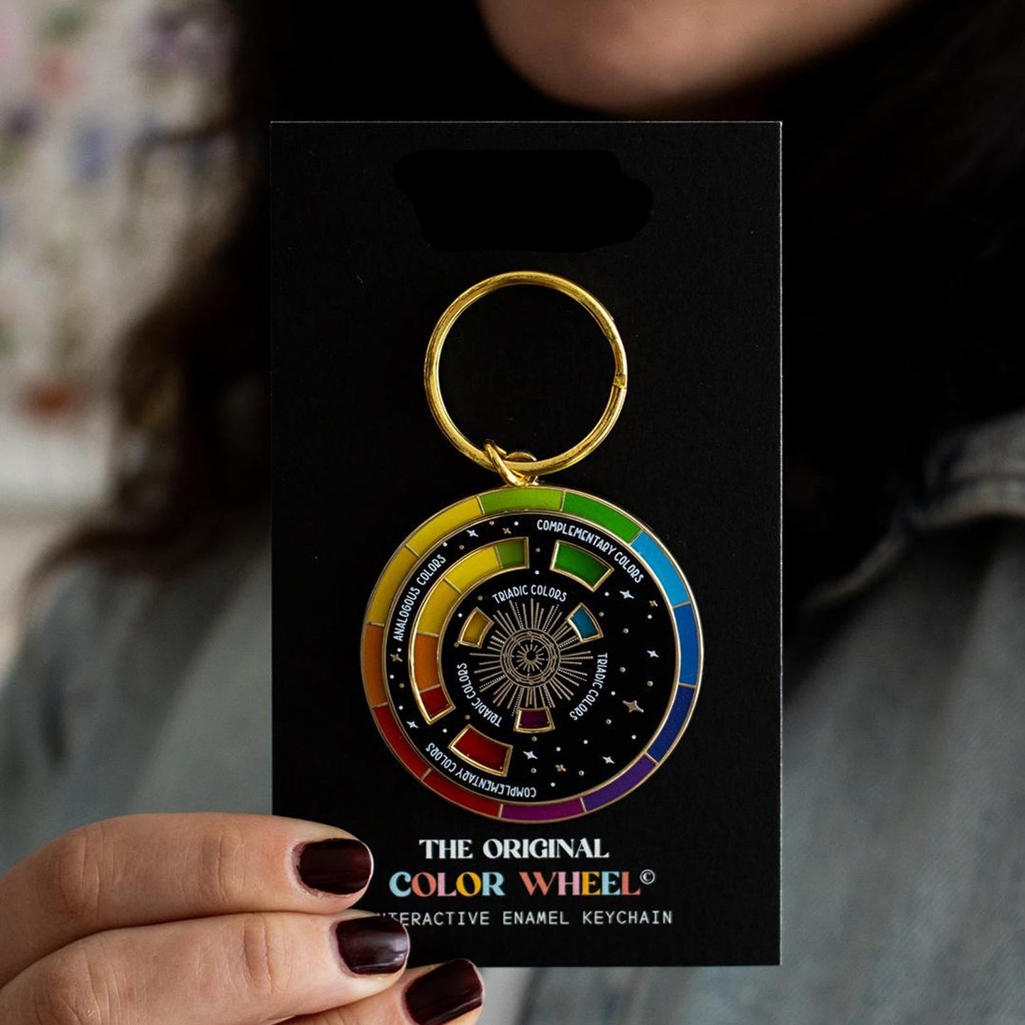 black and gold interactive color wheel keychain for artists