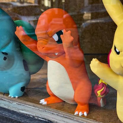 Kawaii creature window set display with cozy pastel decor