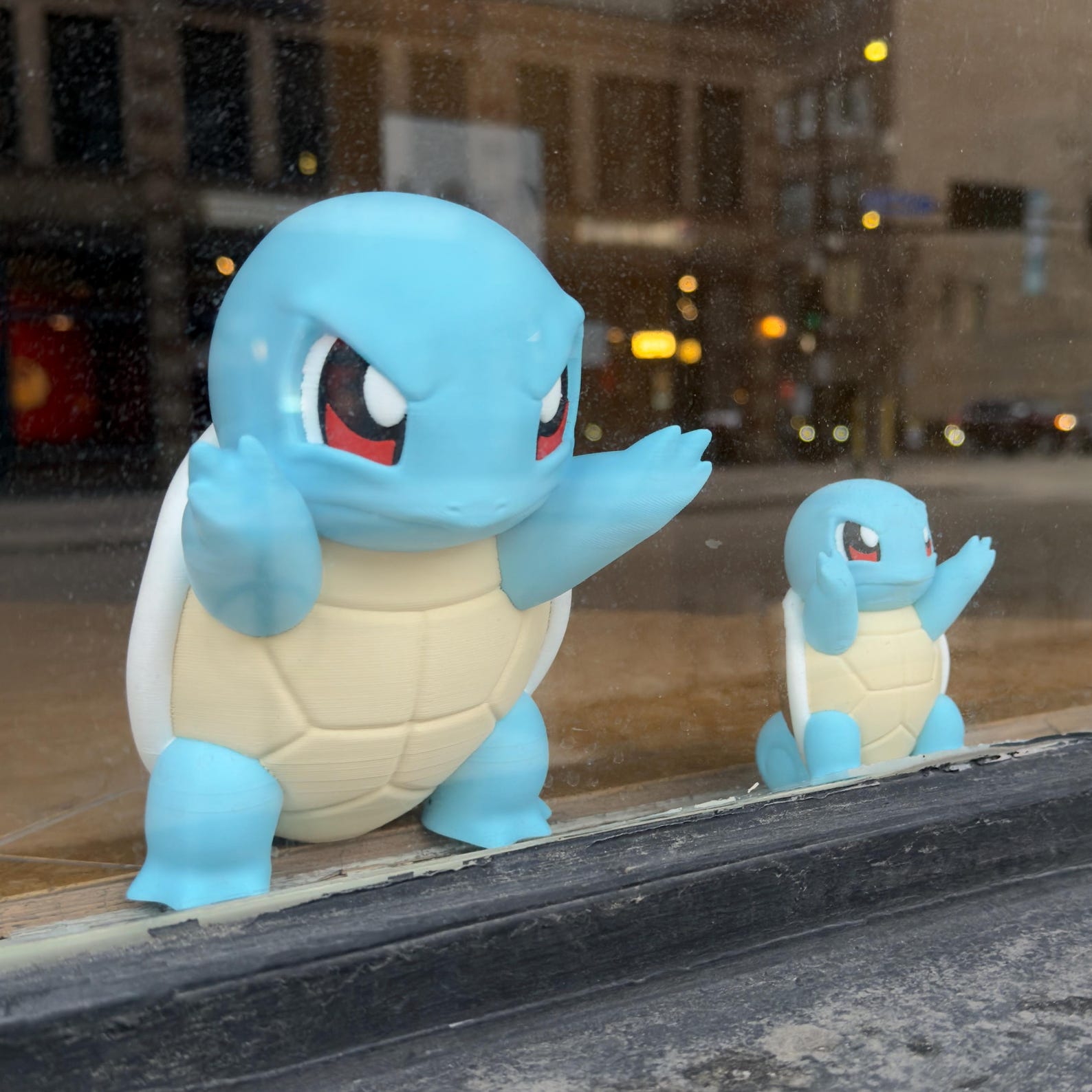 Kawaii creature window set display with cozy pastel decor