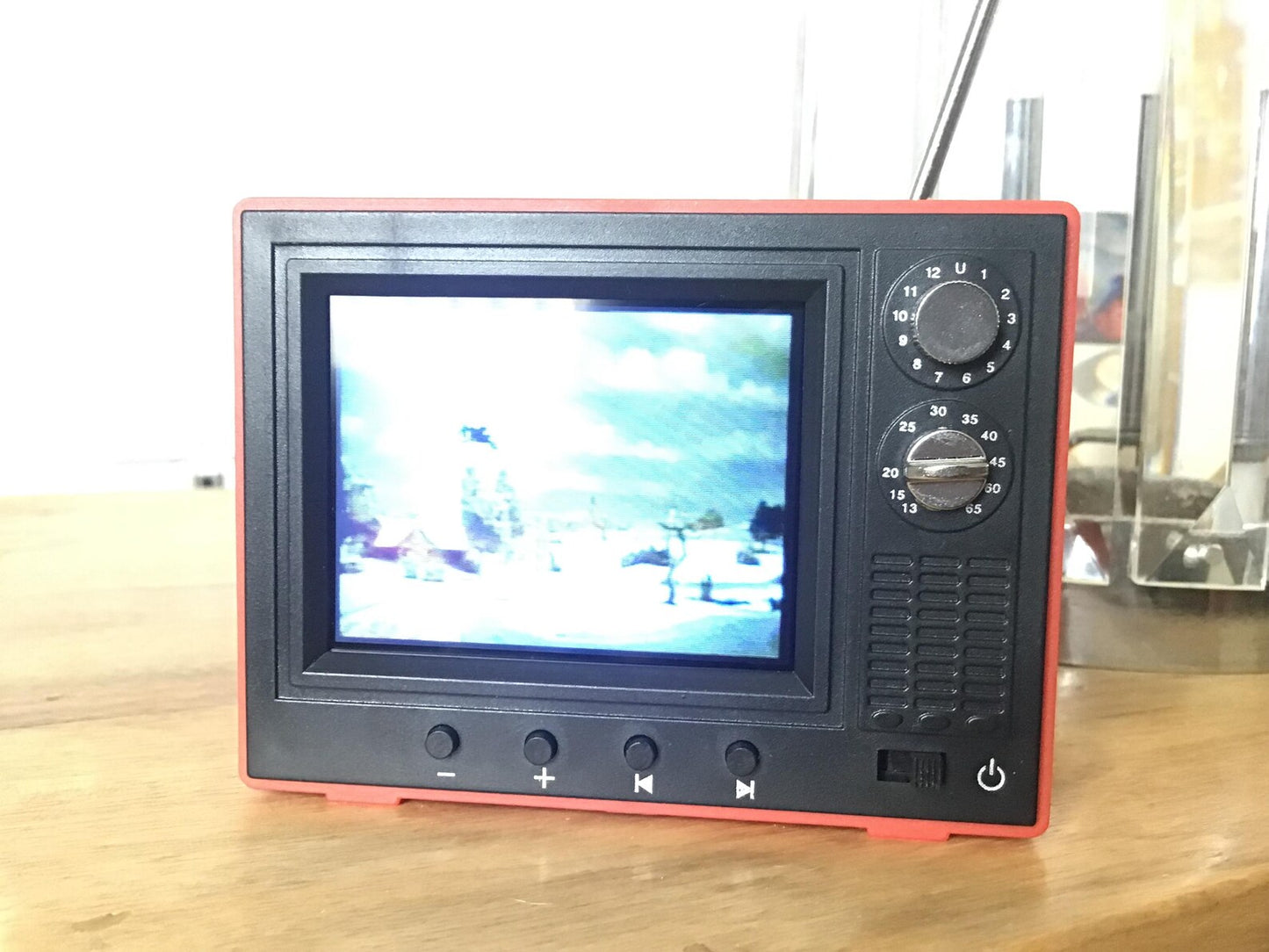 Mini retro TV video player with classic cartoon display