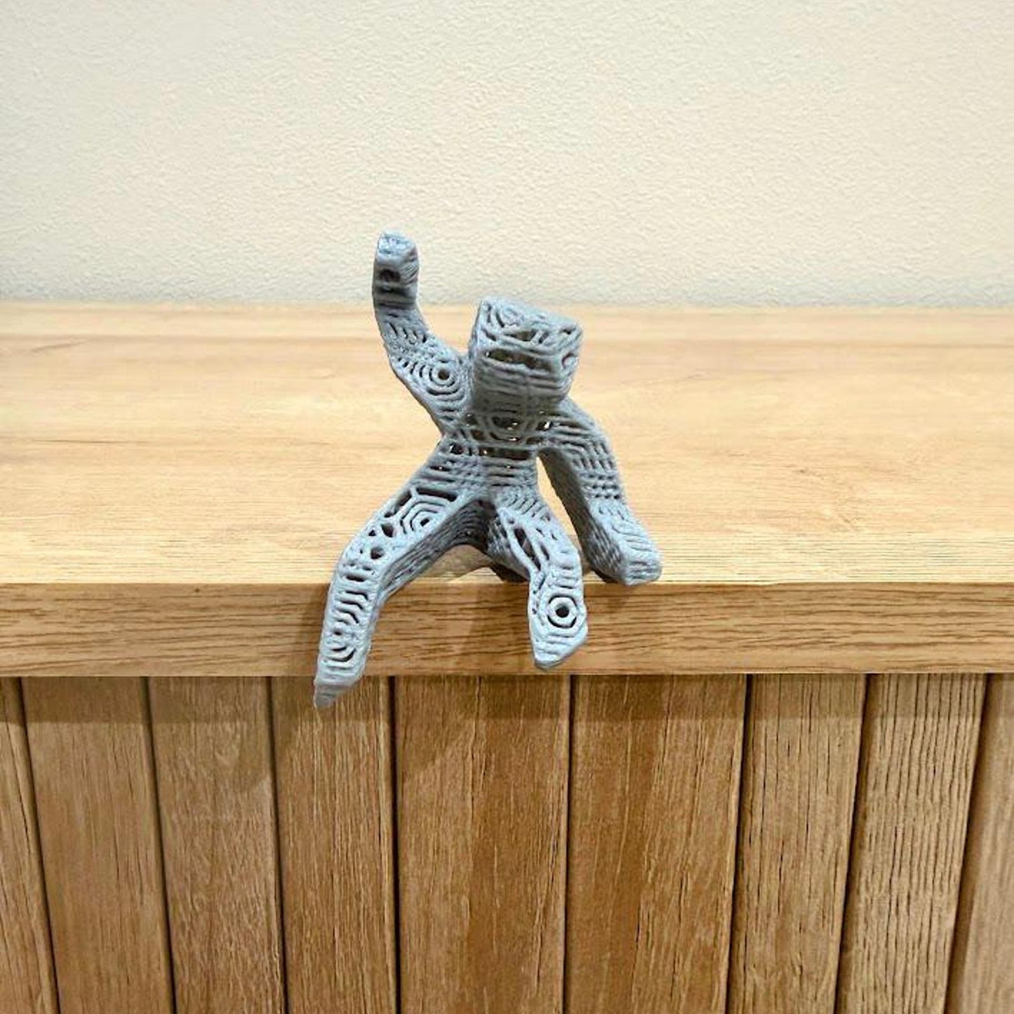 Rocky the Alien and Grace figurines from Project Hail Mary displayed as sci-fi space decor