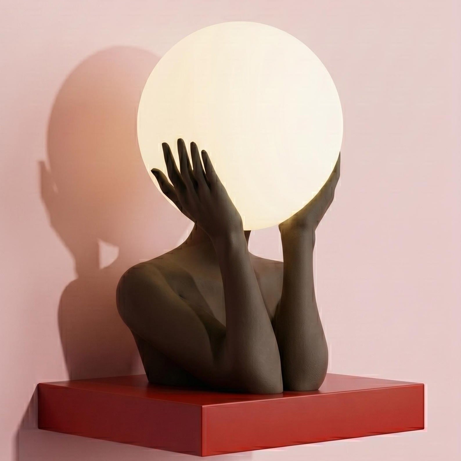 Sculptural sphere table lamp with modern ambient lighting for minimalist bedside decor