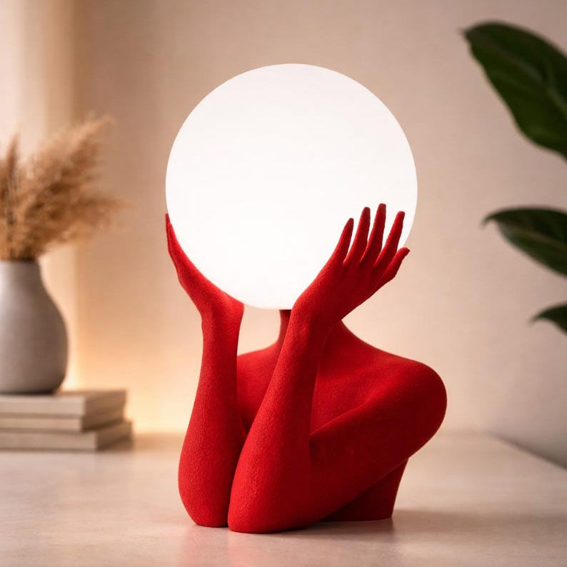 Sculptural sphere table lamp with modern ambient lighting for minimalist bedside decor