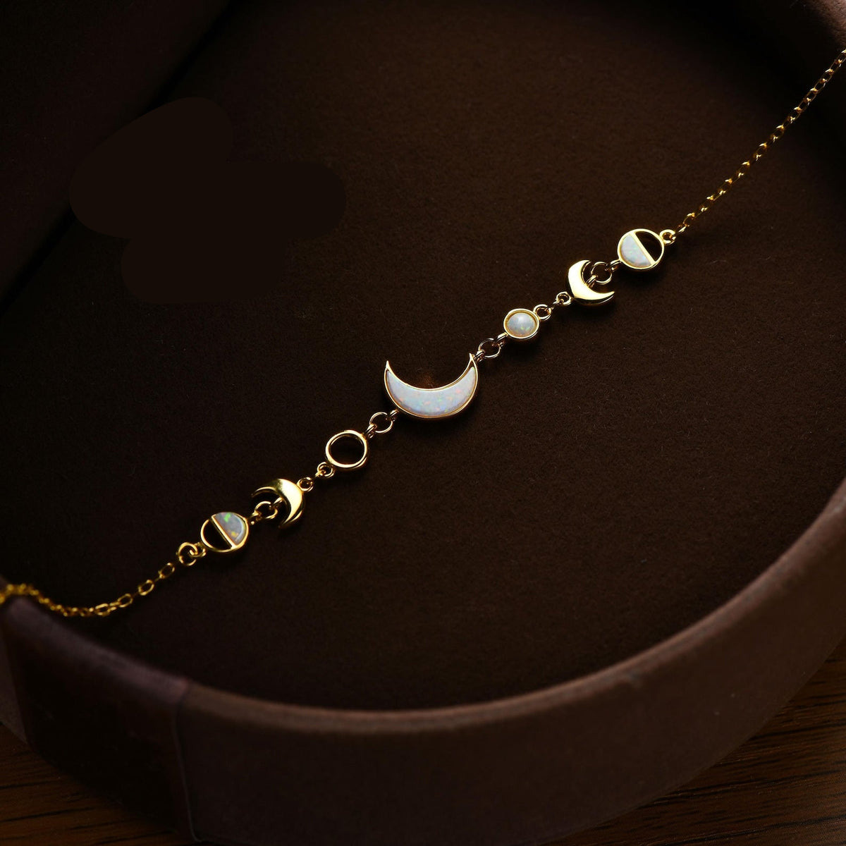 White opal moon phases sterling silver bracelet with fire opal crescent moon charm